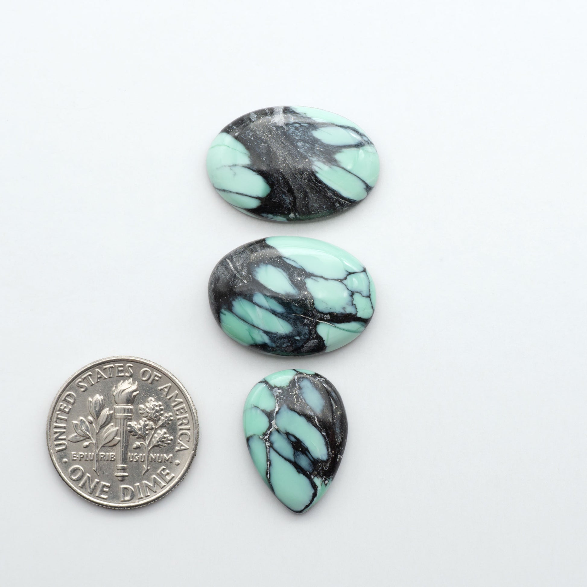 Shop Variscite cabochons with natural matrix patterns, ideal for silversmiths and jewelry makers creating custom rings and pendants.