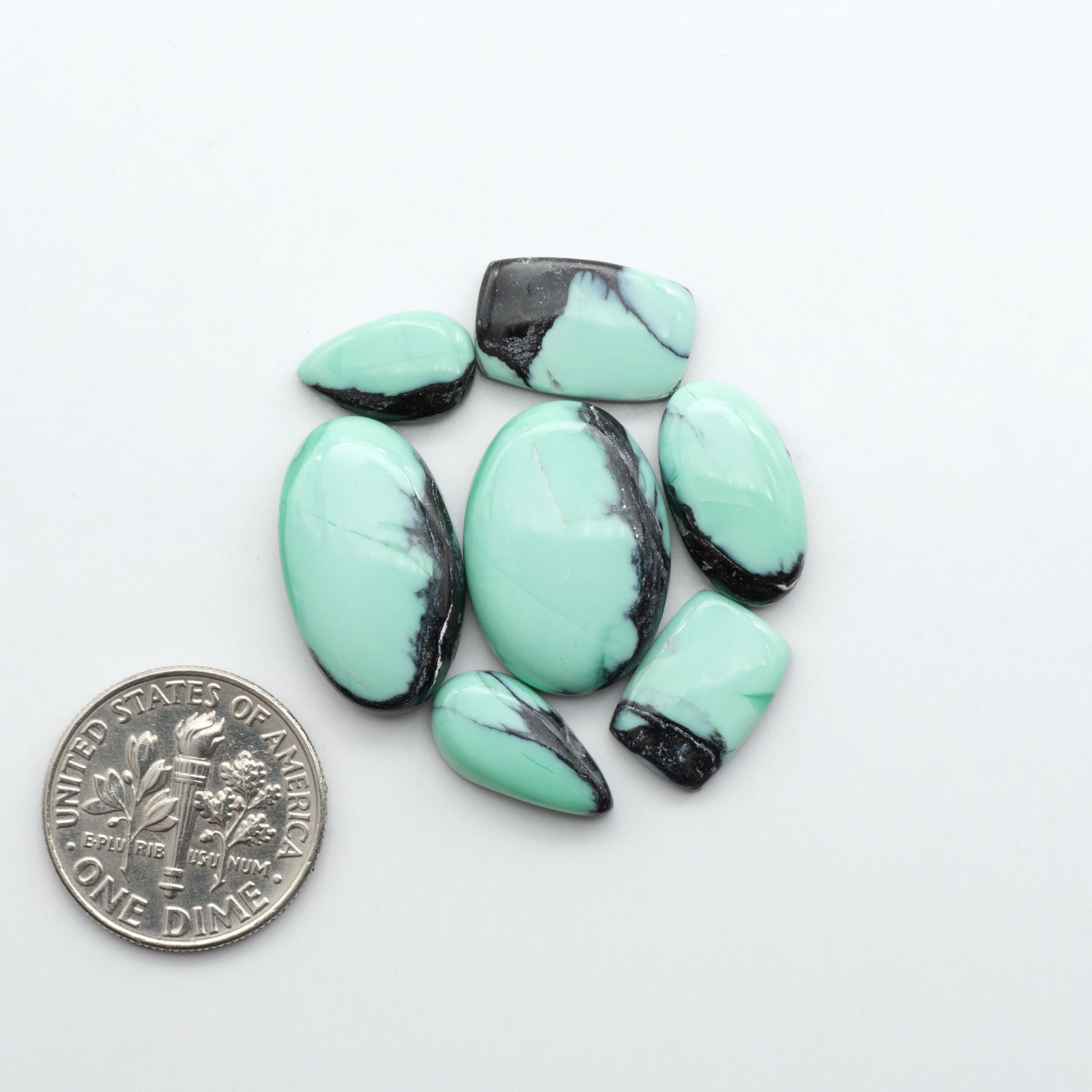 Shop Variscite cabochons with natural matrix patterns, ideal for silversmiths and jewelry makers creating custom rings and pendants.