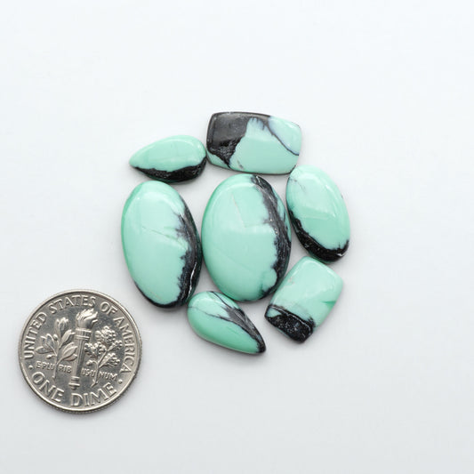 Shop Variscite cabochons with natural matrix patterns, ideal for silversmiths and jewelry makers creating custom rings and pendants.