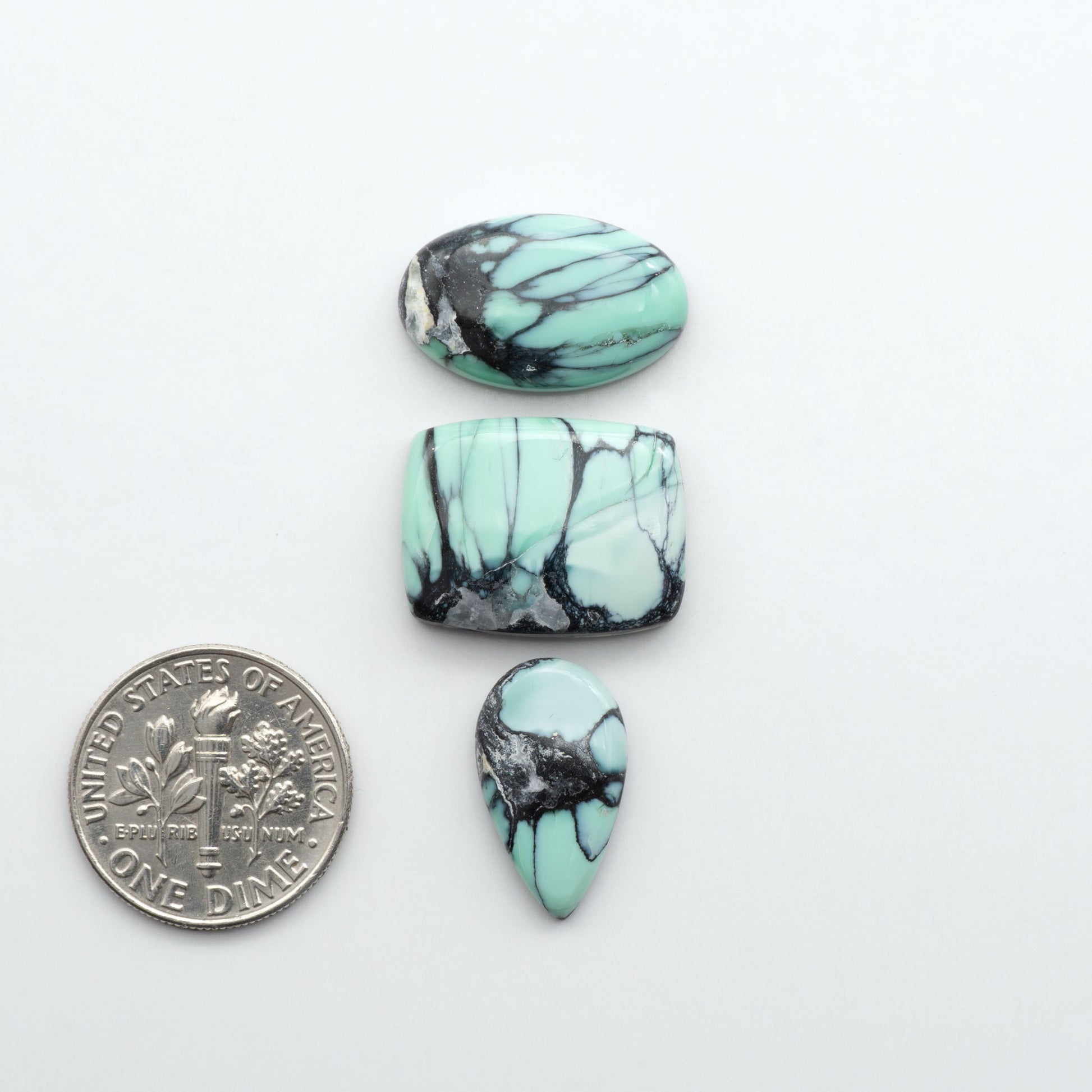 Shop Variscite cabochons with natural matrix patterns, ideal for silversmiths and jewelry makers creating custom rings and pendants.