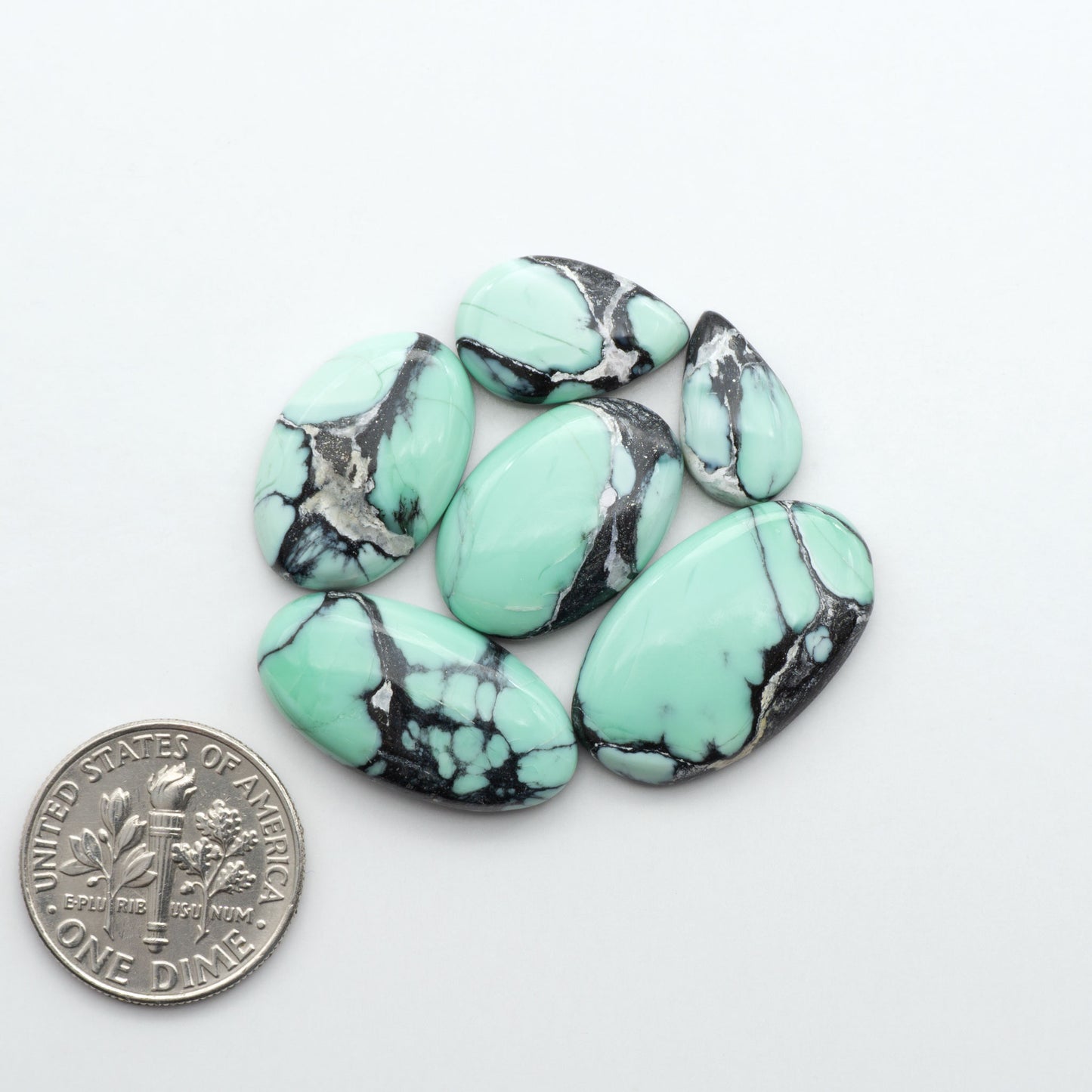 Shop Variscite cabochons with natural matrix patterns, ideal for silversmiths and jewelry makers creating custom rings and pendants.