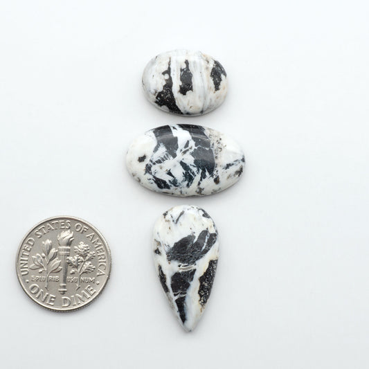 Natural White Buffalo Stone Cabochons are semi-precious gemstones cut into shapes ideal for jewelry-making, making them an excellent choice for artisans.
