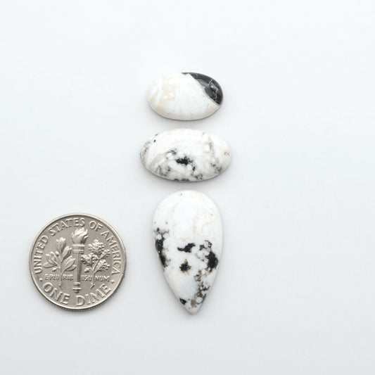 Natural White Buffalo Stone Cabochons are semi-precious gemstones cut into shapes ideal for jewelry-making, making them an excellent choice for artisans.
