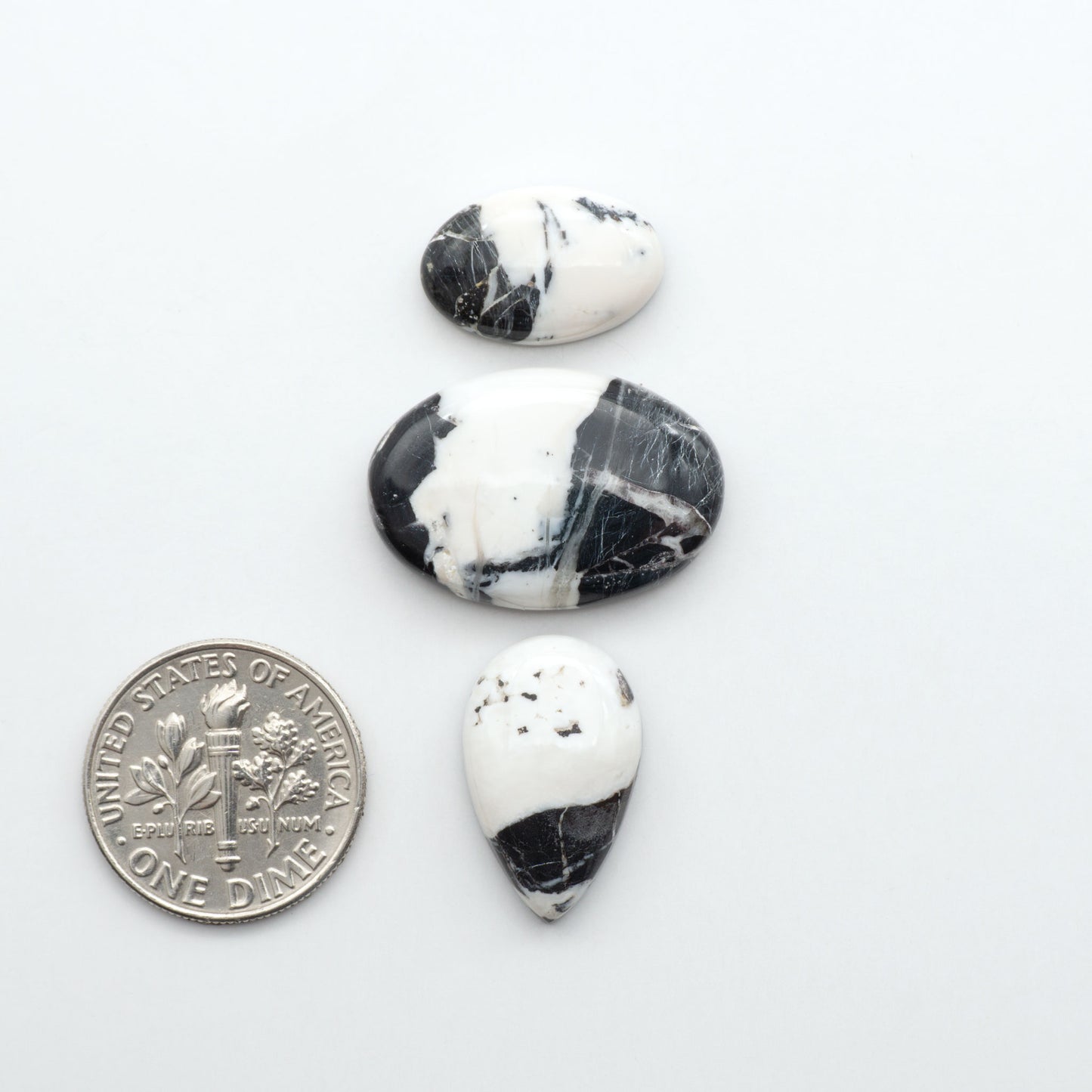 Natural White Buffalo Stone Cabochons are semi-precious gemstones cut into shapes ideal for jewelry-making, making them an excellent choice for artisans.
