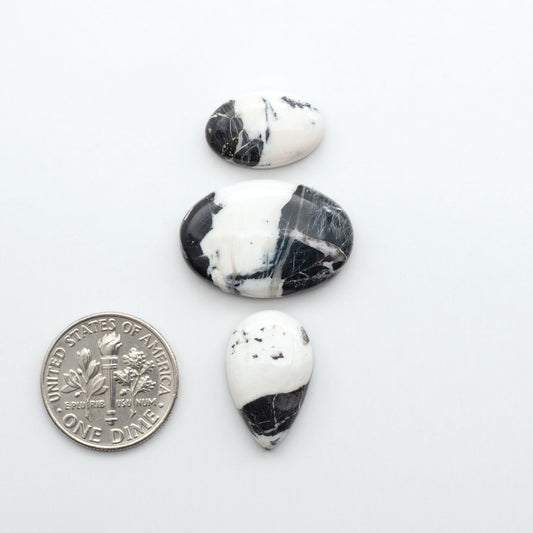 Natural White Buffalo Stone Cabochons are semi-precious gemstones cut into shapes ideal for jewelry-making, making them an excellent choice for artisans.

