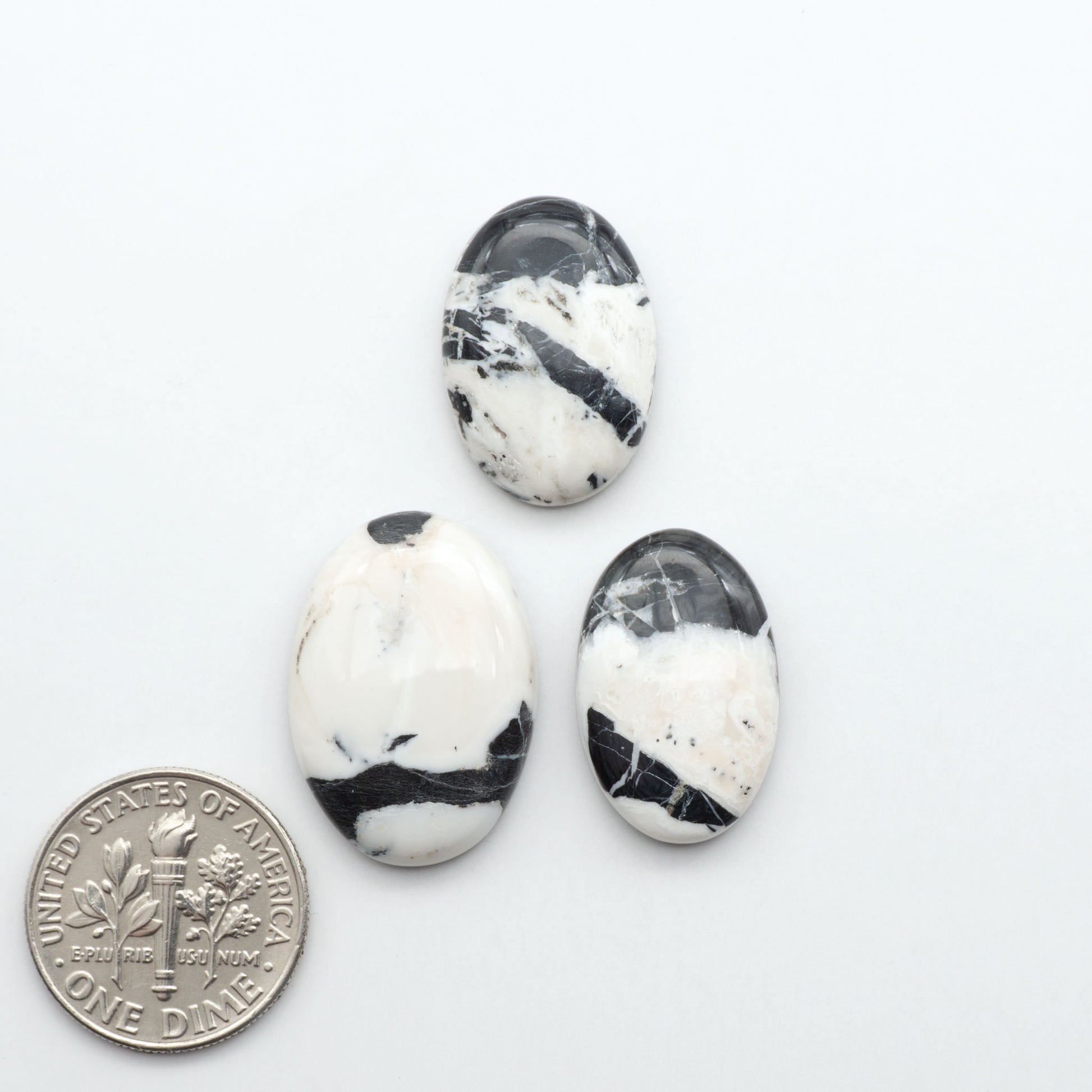 Natural White Buffalo Stone Cabochons are semi-precious gemstones cut into shapes ideal for jewelry-making, making them an excellent choice for artisans.
