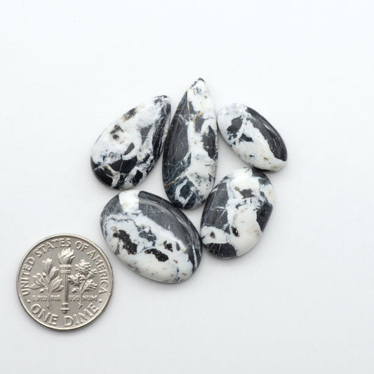 Natural White Buffalo Stone Cabochons are semi-precious gemstones cut into shapes ideal for jewelry-making, making them an excellent choice for artisans.
