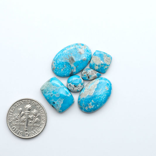 Create stunning handcrafted jewelry with Blue Bird Turquoise Cabochons. Their rich blue color and polish make them perfect for silversmiths and jewelry makers.