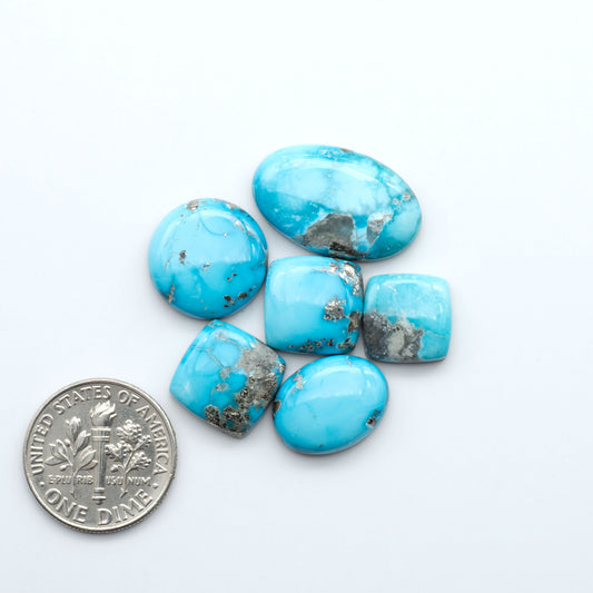 Create stunning handcrafted jewelry with Blue Bird Turquoise Cabochons. Their rich blue color and polish make them perfect for silversmiths and jewelry makers.