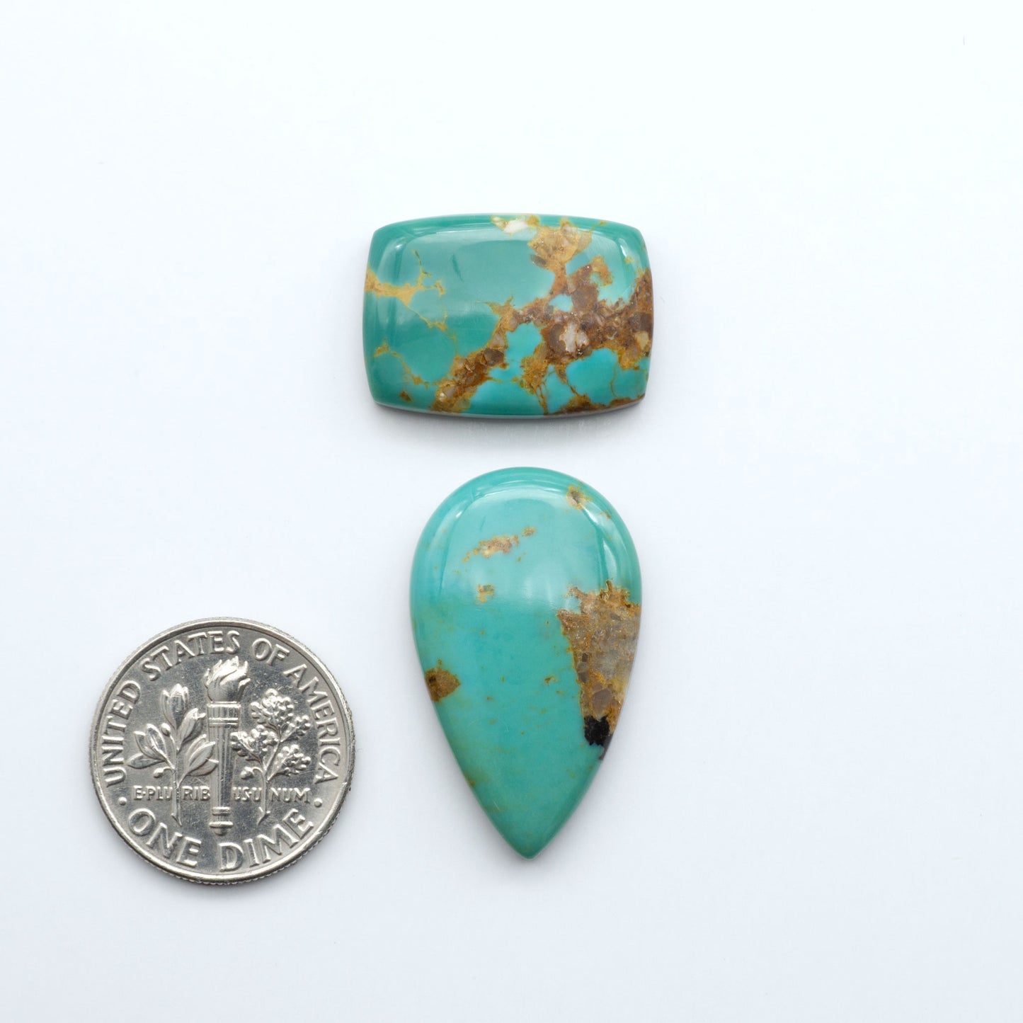 Experience the beauty of Turquoise Mountain Cabochons. With their distinctive blue and green color, these gemstones are perfect for any jewelry piece.