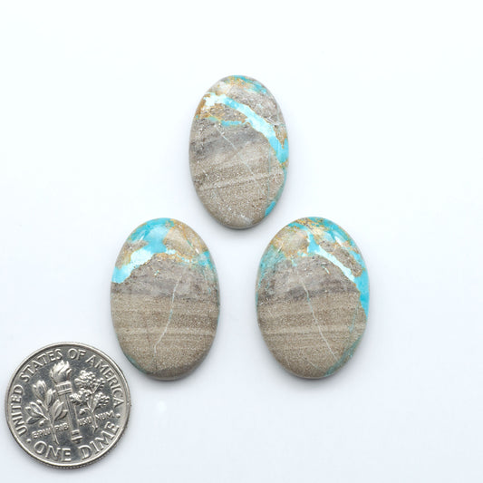 Carico Lake Turquoise cabochons with vibrant aqua-blue to turquoise tones and natural matrix, ideal for rings, pendants, and artisan jewelry.
