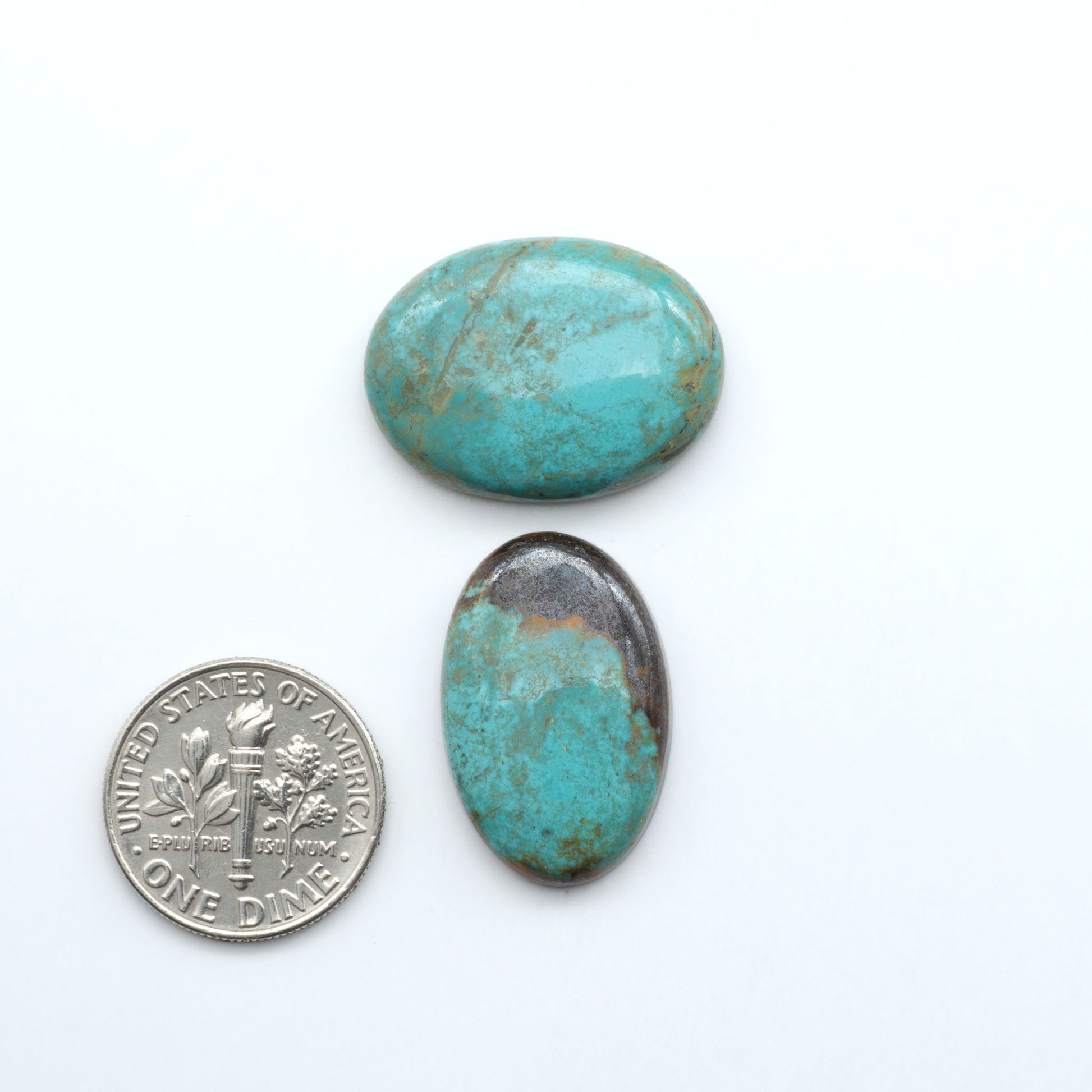 Add a touch of beauty to your collection with our stunning Pilot Mountain Turquoise Cabochons. Perfect for jewelry making each piece is truly one-of-a-kind
