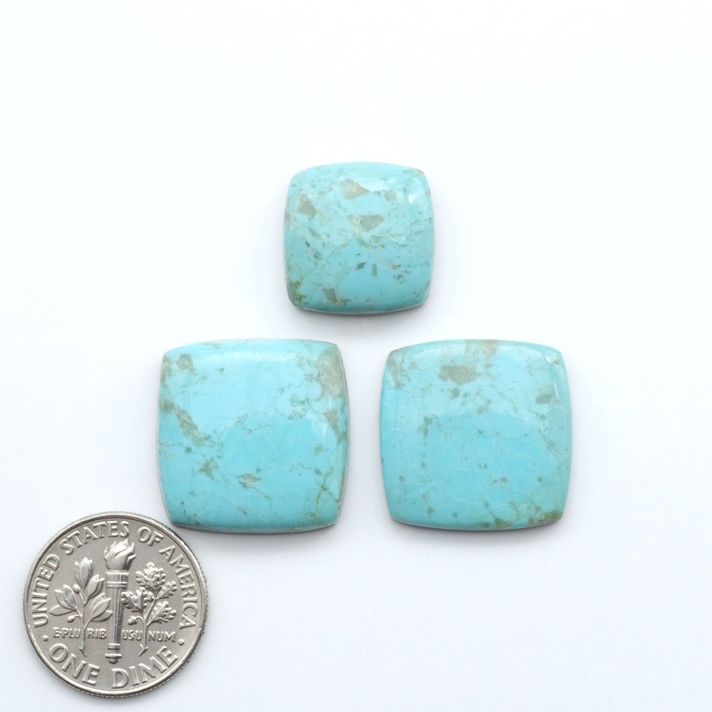 Add a touch of beauty to your collection with our stunning Pilot Mountain Turquoise Cabochons. Perfect for jewelry making each piece is truly one-of-a-kind