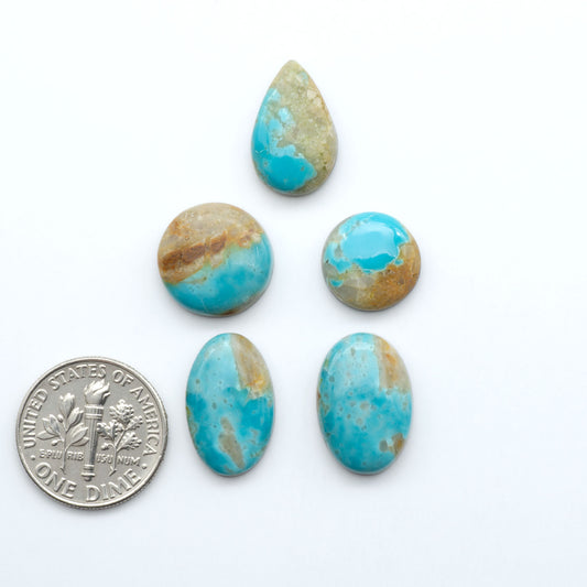 Add a touch of beauty to your collection with our stunning Pilot Mountain Turquoise Cabochons. Perfect for jewelry making each piece is truly one-of-a-kind