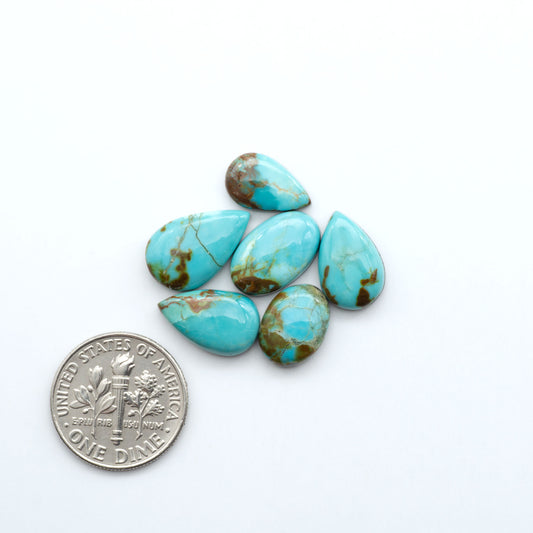 Add a touch of beauty to your collection with our stunning Pilot Mountain Turquoise Cabochons. Perfect for jewelry making each piece is truly one-of-a-kind
