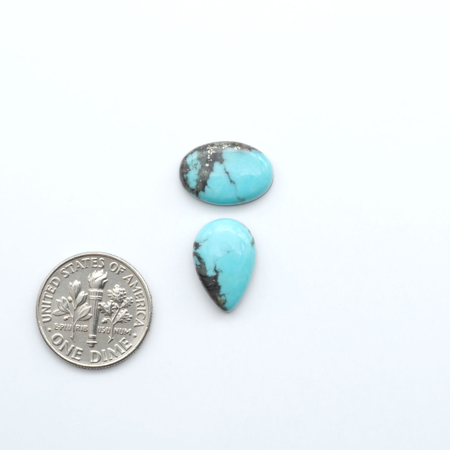 Add a touch of beauty to your collection with our stunning Pilot Mountain Turquoise Cabochons. Perfect for jewelry making each piece is truly one-of-a-kind