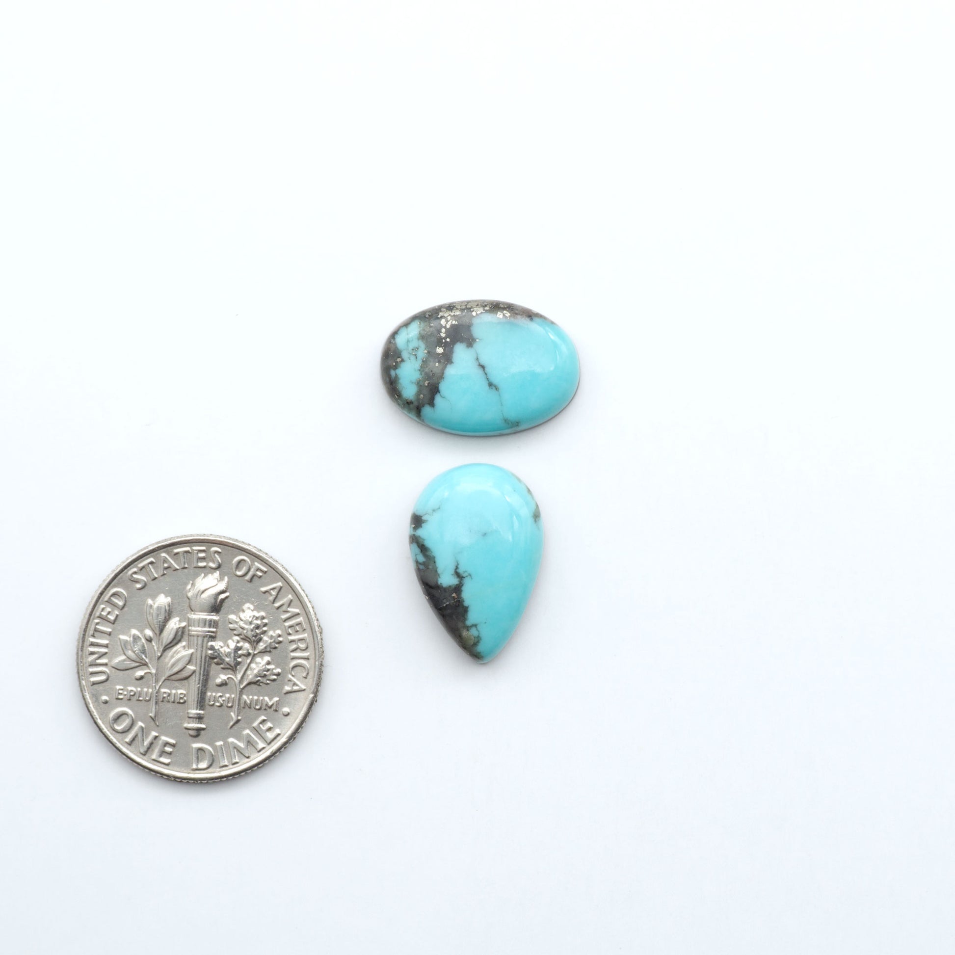 Add a touch of beauty to your collection with our stunning Pilot Mountain Turquoise Cabochons. Perfect for jewelry making each piece is truly one-of-a-kind