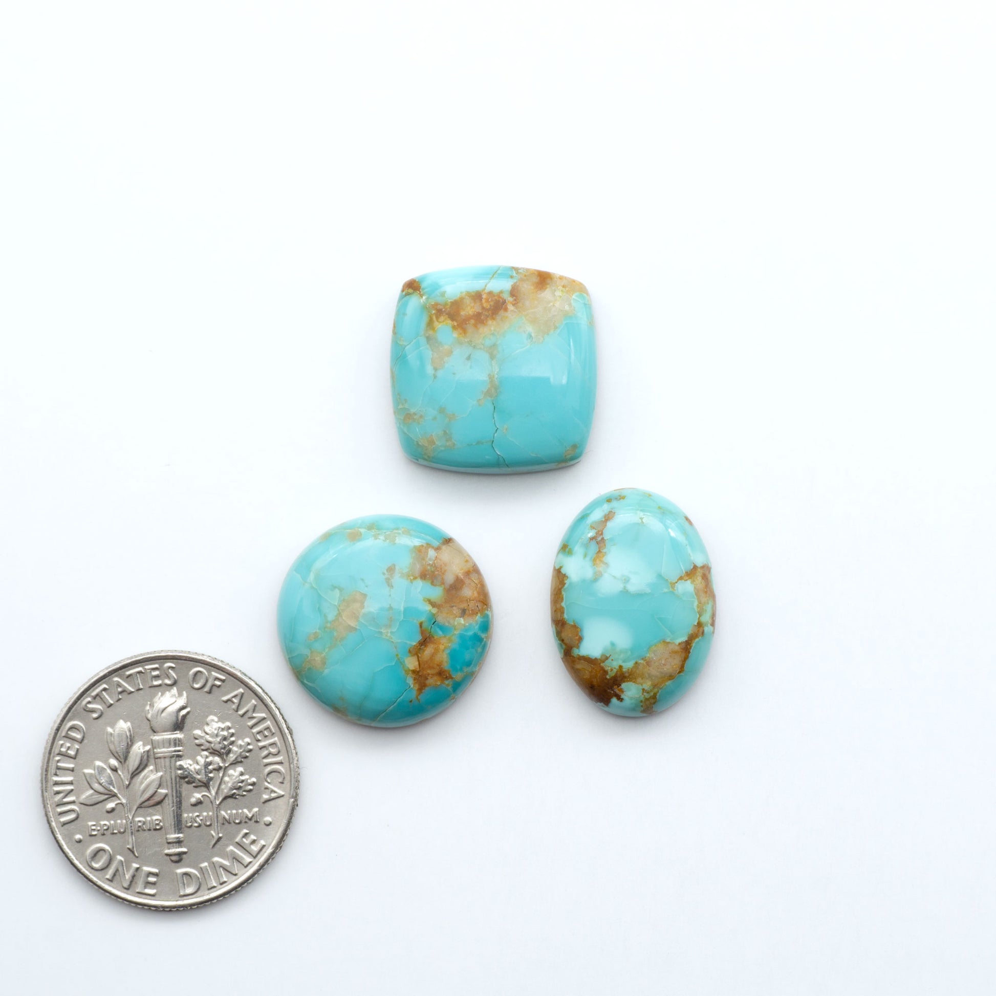 Add a touch of beauty to your collection with our stunning Pilot Mountain Turquoise Cabochons. Perfect for jewelry making each piece is truly one-of-a-kind