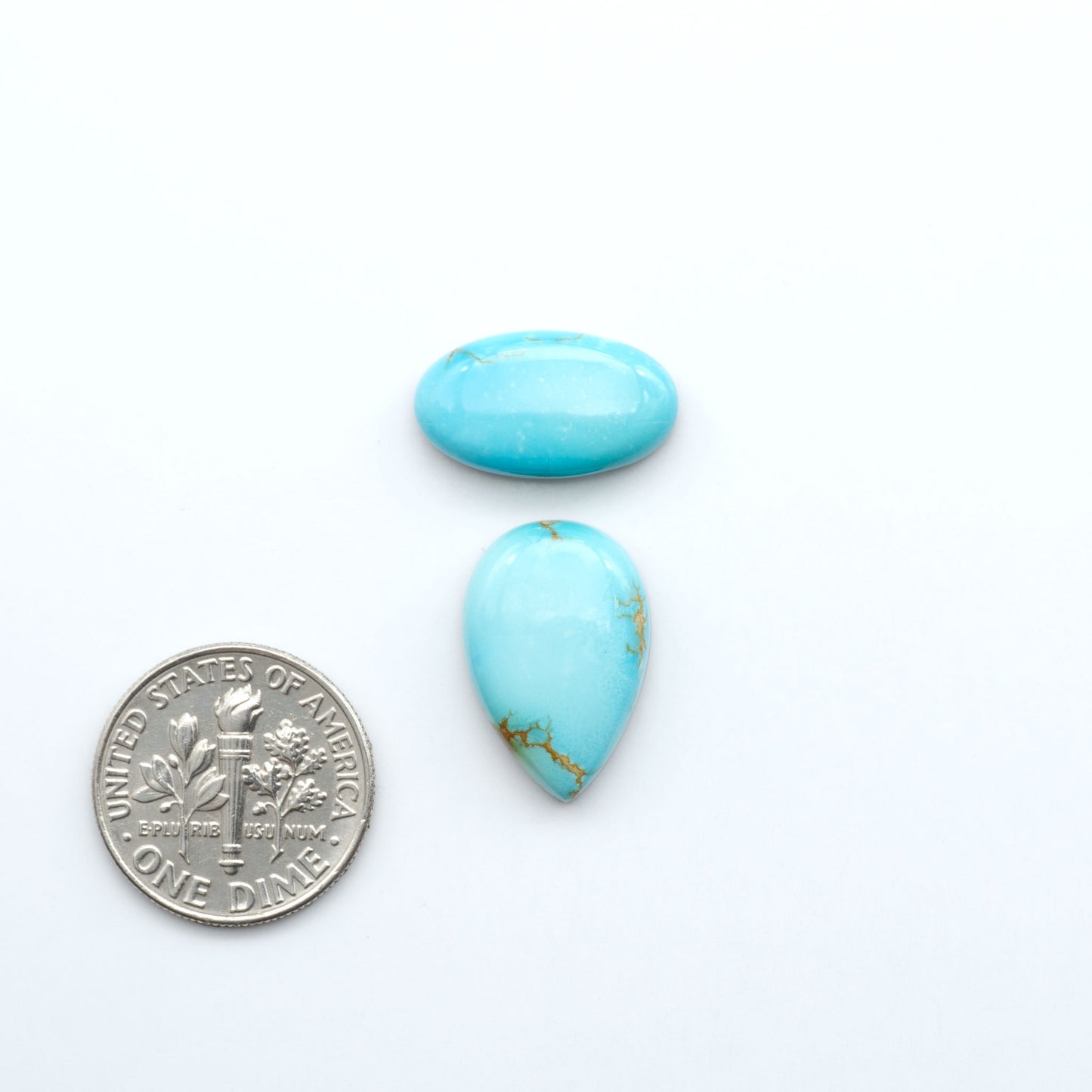Sierra Bella Turquoise cabochons feature rich blue-green color and natural matrix variation. Ideal for silversmiths, jewelers, and custom jewelry designs.