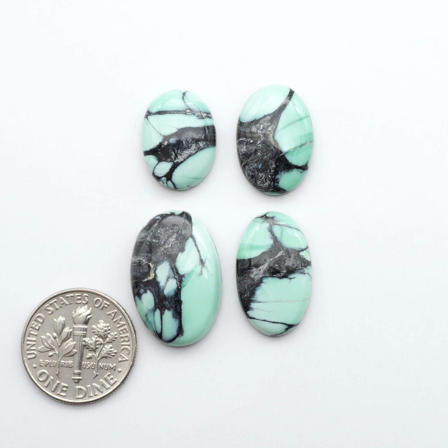 Shop Variscite cabochons with natural matrix patterns, ideal for silversmiths and jewelry makers creating custom rings and pendants.