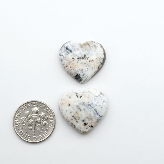 Natural White Buffalo Stone Cabochons are semi-precious gemstones cut into shapes ideal for jewelry-making, making them an excellent choice for artisans.