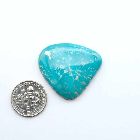 Shop authentic Blue Gem Turquoise cabochons—rare Nevada stones with vibrant blues and greens, perfect for artisan jewelry and collectors.
