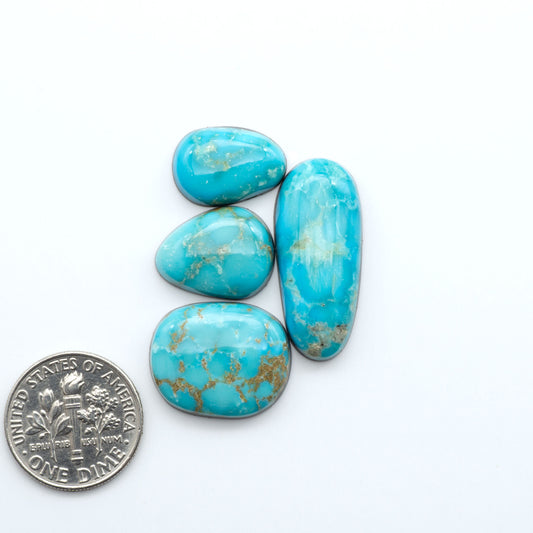 Shop authentic Blue Gem Turquoise cabochons—rare Nevada stones with vibrant blues and greens, perfect for artisan jewelry and collectors.
