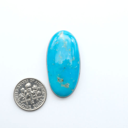 Shop authentic Blue Gem Turquoise cabochons—rare Nevada stones with vibrant blues and greens, perfect for artisan jewelry and collectors.
