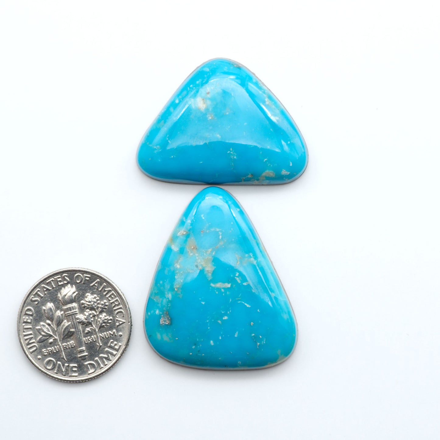 Shop authentic Blue Gem Turquoise cabochons—rare Nevada stones with vibrant blues and greens, perfect for artisan jewelry and collectors.
