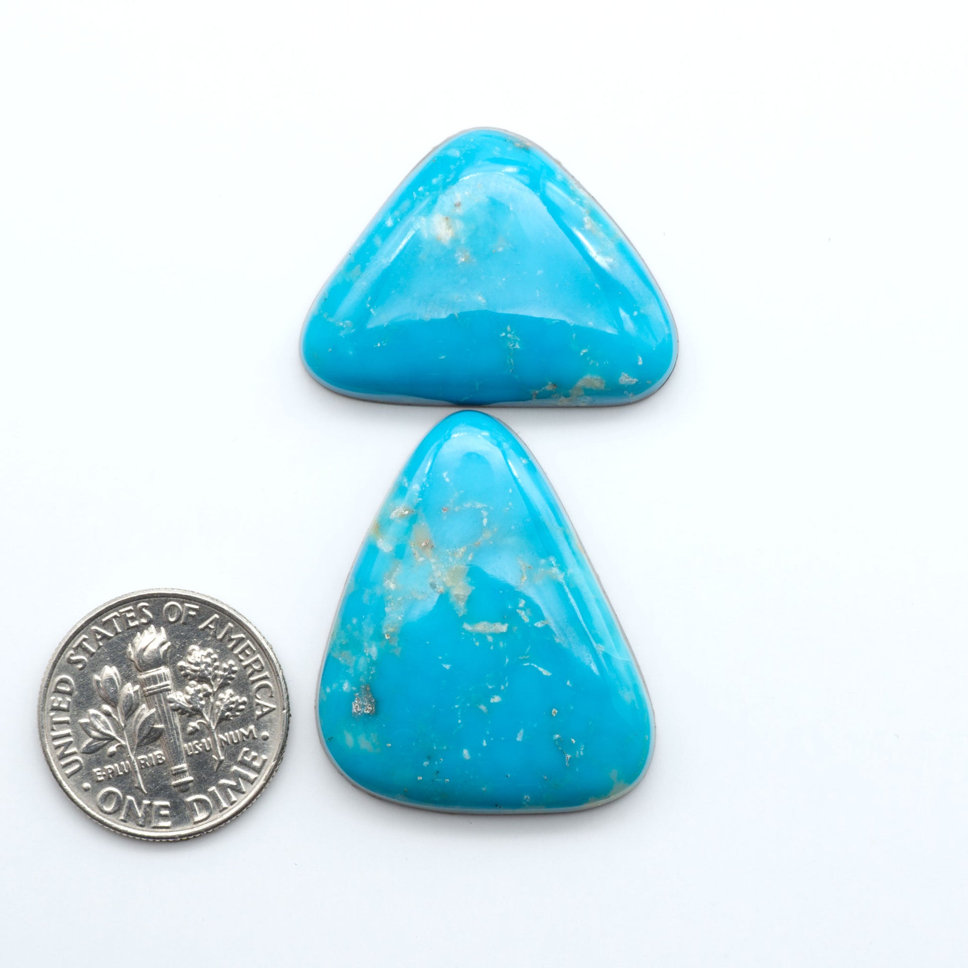 Shop authentic Blue Gem Turquoise cabochons—rare Nevada stones with vibrant blues and greens, perfect for artisan jewelry and collectors.
