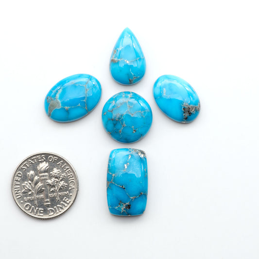 Create stunning handcrafted jewelry with Blue Bird Turquoise Cabochons. Their rich blue color and polish make them perfect for silversmiths and jewelry makers.
