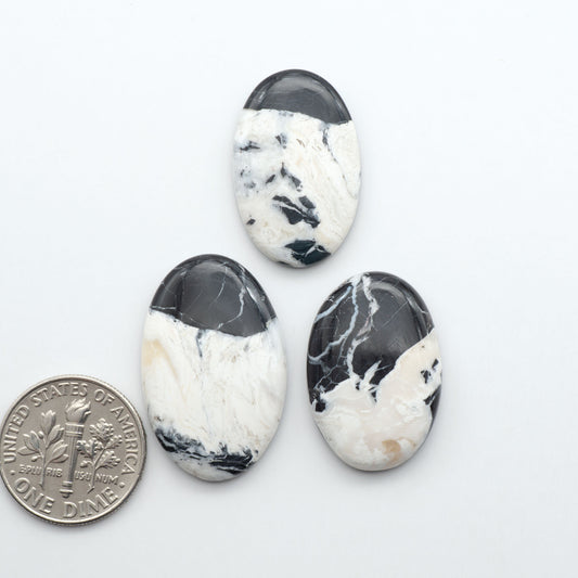Natural White Buffalo Stone Cabochons are semi-precious gemstones cut into shapes ideal for jewelry-making, making them an excellent choice for artisans.