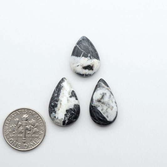 Natural White Buffalo Stone Cabochons are semi-precious gemstones cut into shapes ideal for jewelry-making, making them an excellent choice for artisans.
