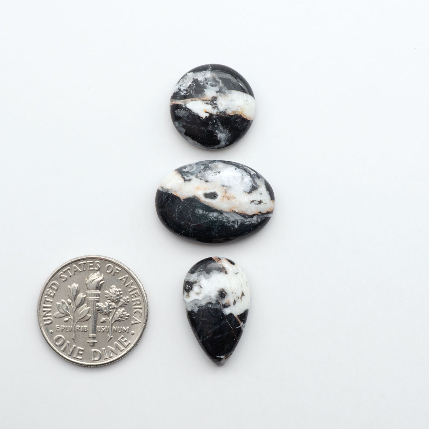 Natural White Buffalo Stone Cabochons are semi-precious gemstones cut into shapes ideal for jewelry-making, making them an excellent choice for artisans.