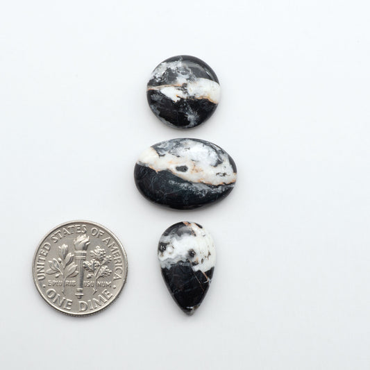 Natural White Buffalo Stone Cabochons are semi-precious gemstones cut into shapes ideal for jewelry-making, making them an excellent choice for artisans.