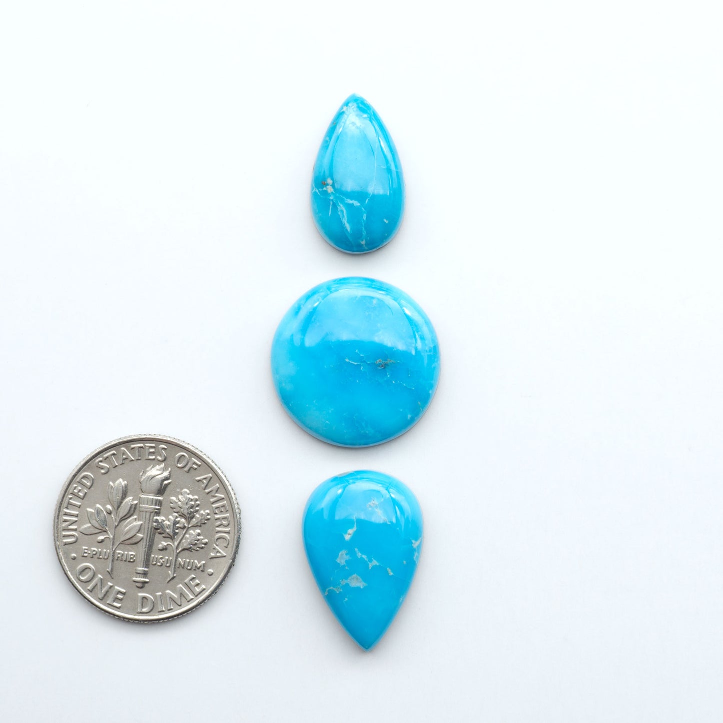 Sierra Bella Turquoise cabochons feature rich blue-green color and natural matrix variation. Ideal for silversmiths, jewelers, and custom jewelry designs.