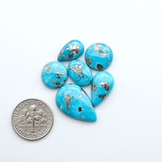Sierra Bella Turquoise cabochons feature rich blue-green color and natural matrix variation. Ideal for silversmiths, jewelers, and custom jewelry designs.