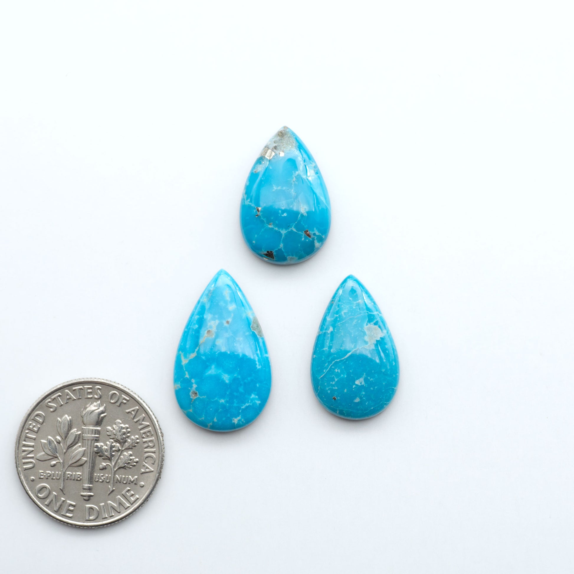 Sierra Bella Turquoise cabochons feature rich blue-green color and natural matrix variation. Ideal for silversmiths, jewelers, and custom jewelry designs.
