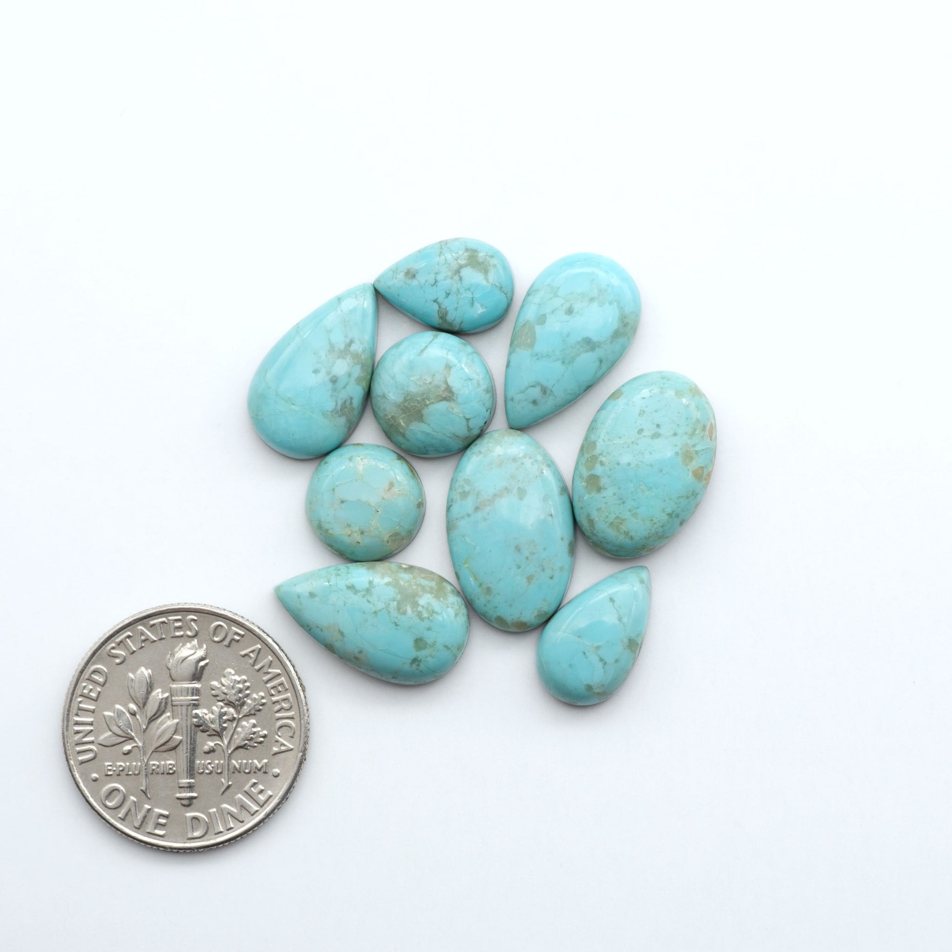Add a touch of beauty to your collection with our stunning Pilot Mountain Turquoise Cabochons. Perfect for jewelry making each piece is truly one-of-a-kind.