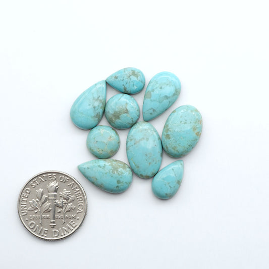 Add a touch of beauty to your collection with our stunning Pilot Mountain Turquoise Cabochons. Perfect for jewelry making each piece is truly one-of-a-kind.