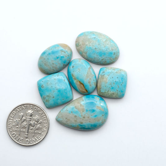Add a touch of beauty to your collection with our stunning Pilot Mountain Turquoise Cabochons. Perfect for jewelry making each piece is truly one-of-a-kind.