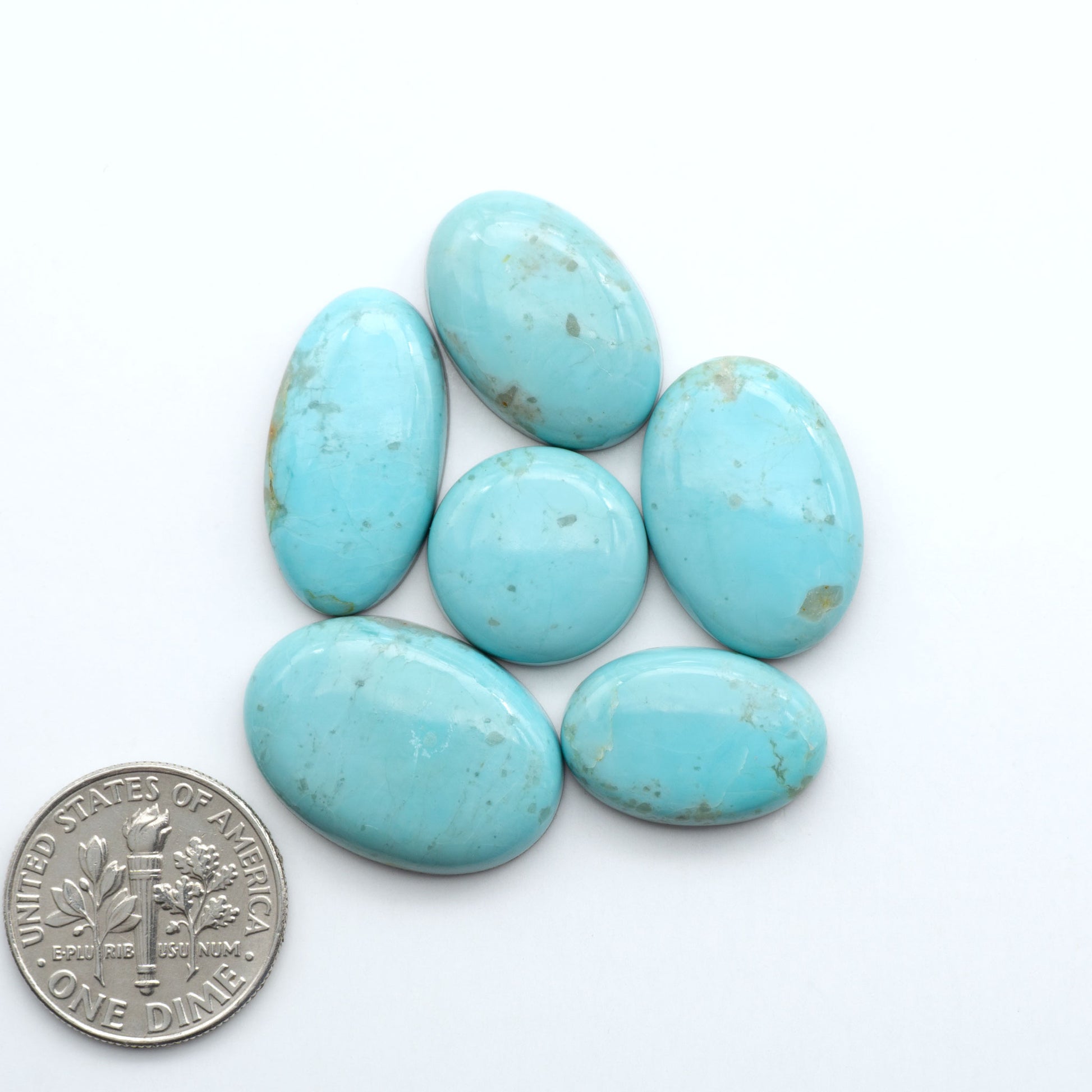 Add a touch of beauty to your collection with our stunning Pilot Mountain Turquoise Cabochons. Perfect for jewelry making each piece is truly one-of-a-kind.