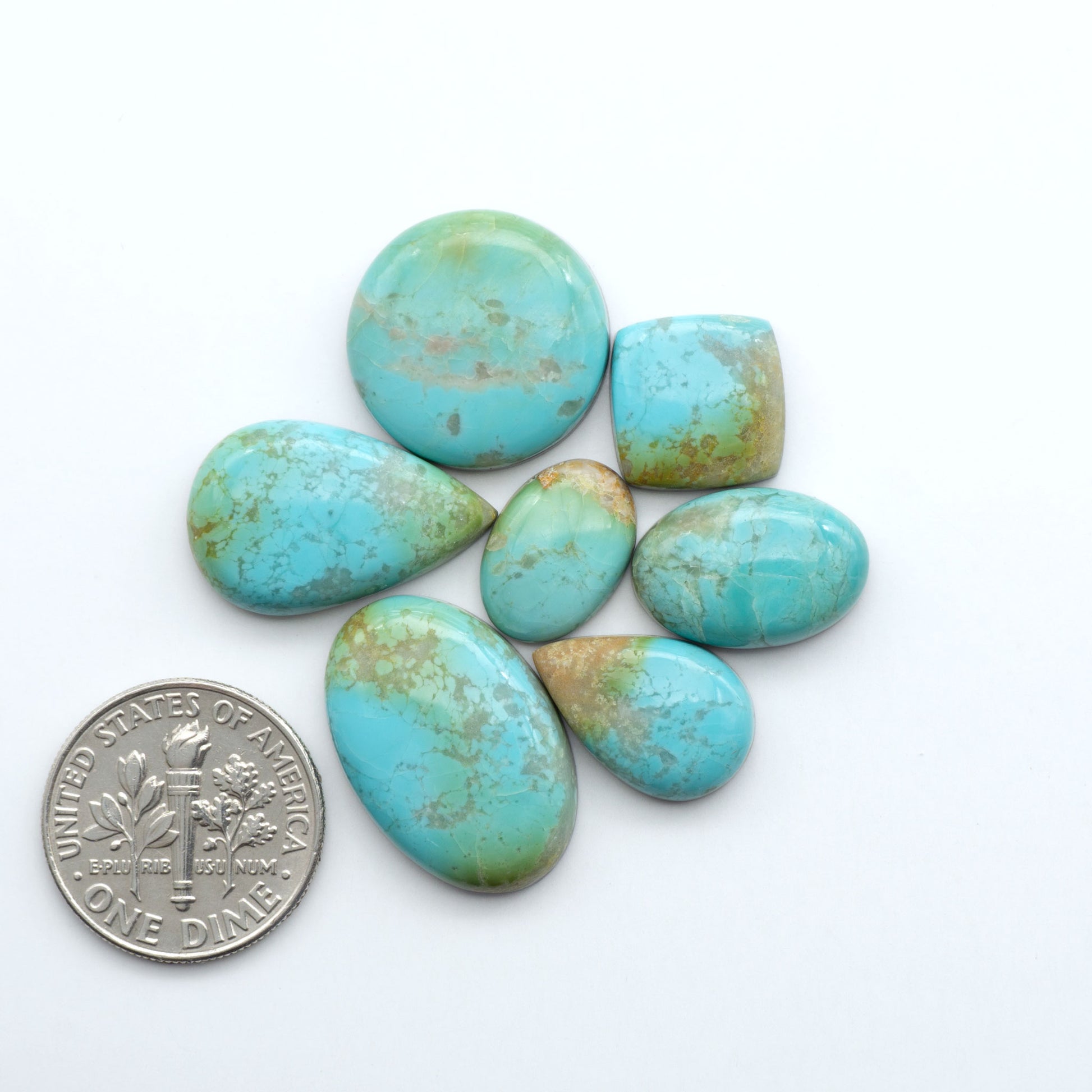 Add a touch of beauty to your collection with our stunning Pilot Mountain Turquoise Cabochons. Perfect for jewelry making each piece is truly one-of-a-kind.