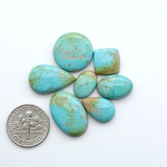 Add a touch of beauty to your collection with our stunning Pilot Mountain Turquoise Cabochons. Perfect for jewelry making each piece is truly one-of-a-kind.