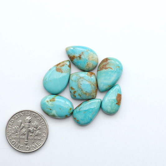 Add a touch of beauty to your collection with our stunning Pilot Mountain Turquoise Cabochons. Perfect for jewelry making each piece is truly one-of-a-kind.