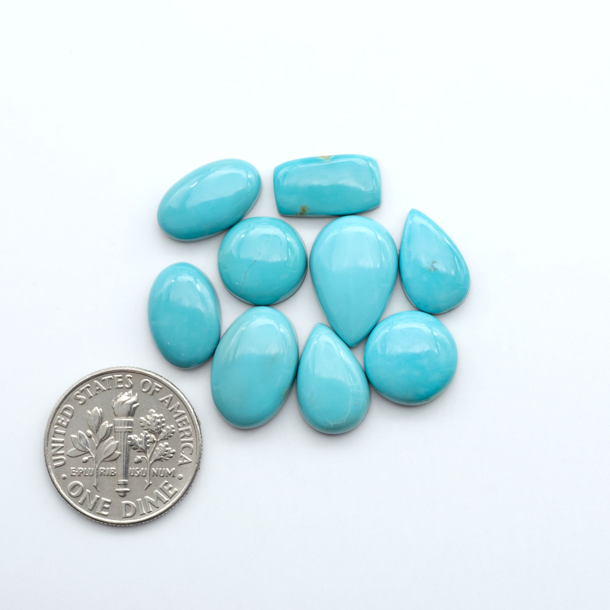 Add a touch of beauty to your collection with our stunning Pilot Mountain Turquoise Cabochons. Perfect for jewelry making each piece is truly one-of-a-kind.