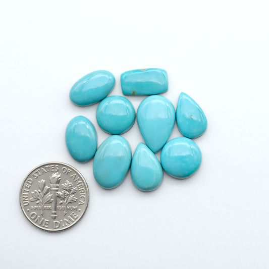 Add a touch of beauty to your collection with our stunning Pilot Mountain Turquoise Cabochons. Perfect for jewelry making each piece is truly one-of-a-kind.