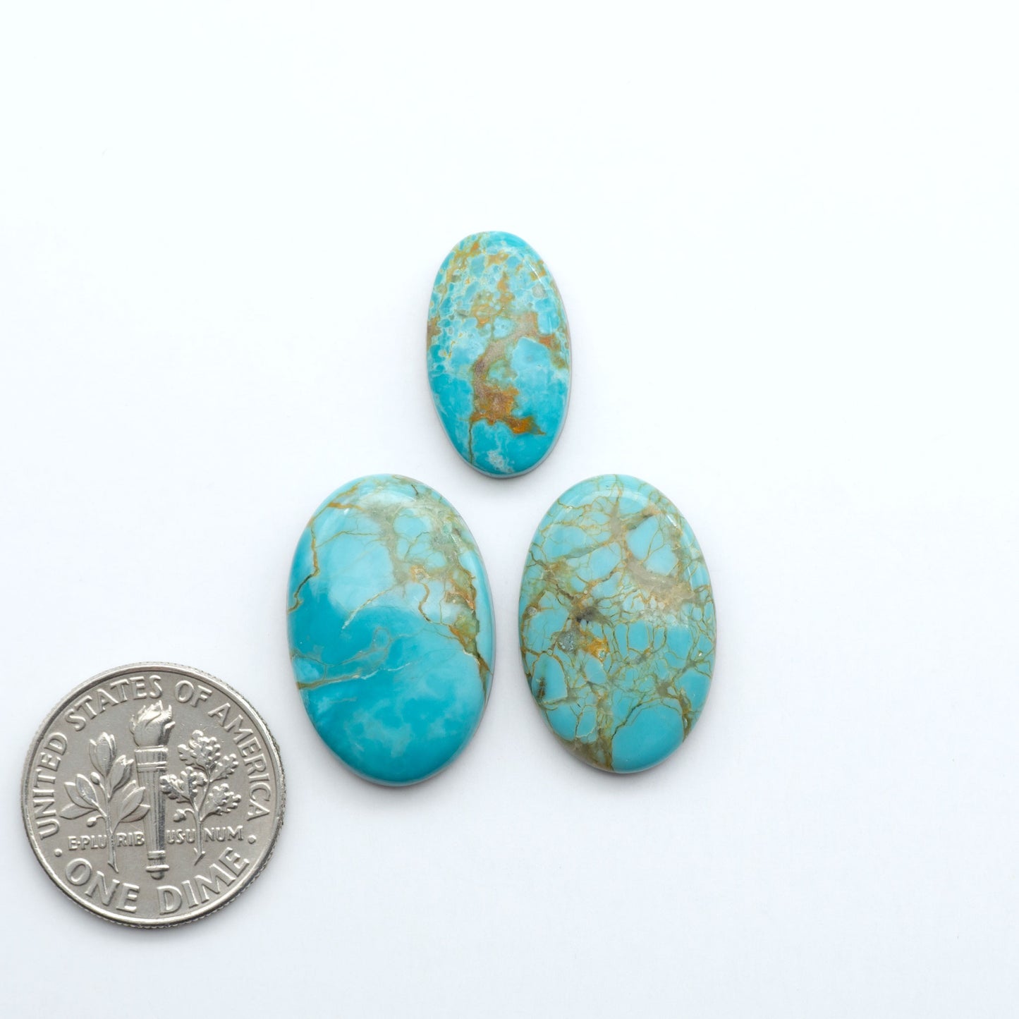 Add a touch of beauty to your collection with our stunning Pilot Mountain Turquoise Cabochons. Perfect for jewelry making each piece is truly one-of-a-kind.