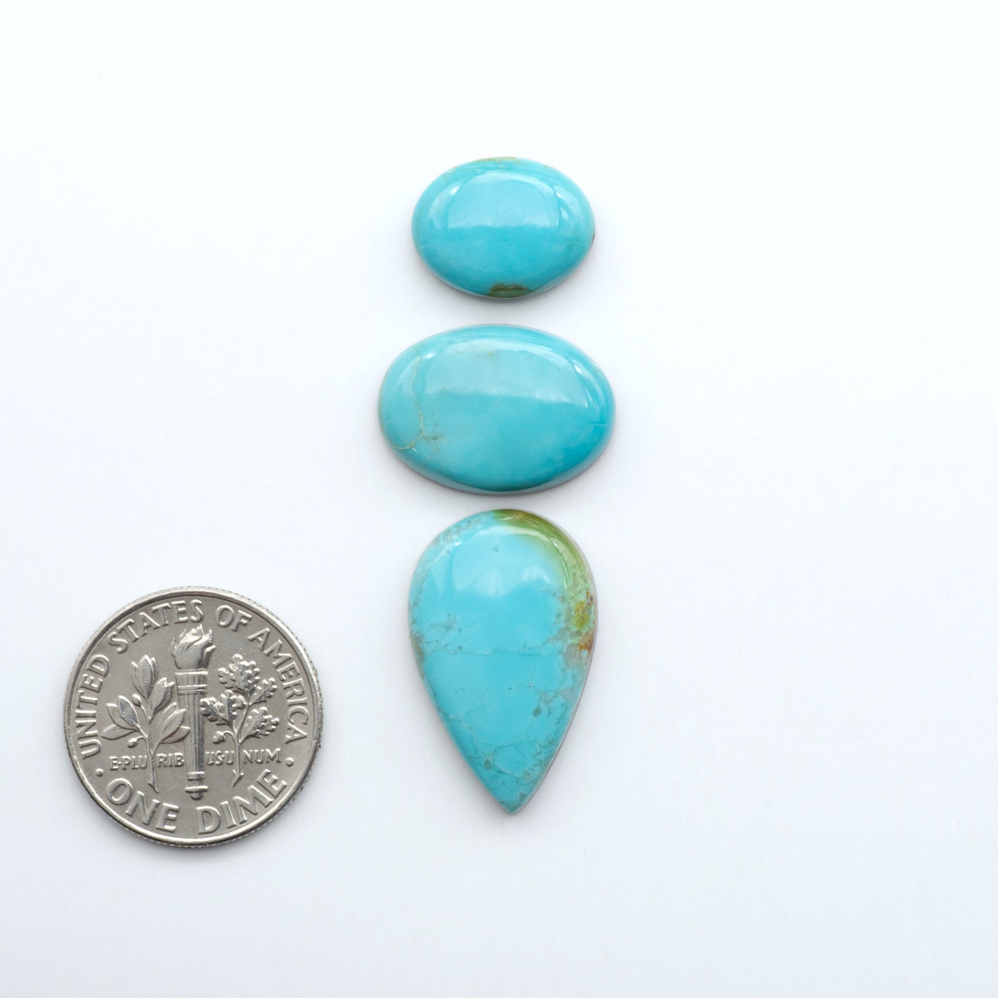 Add a touch of beauty to your collection with our stunning Pilot Mountain Turquoise Cabochons. Perfect for jewelry making each piece is truly one-of-a-kind.