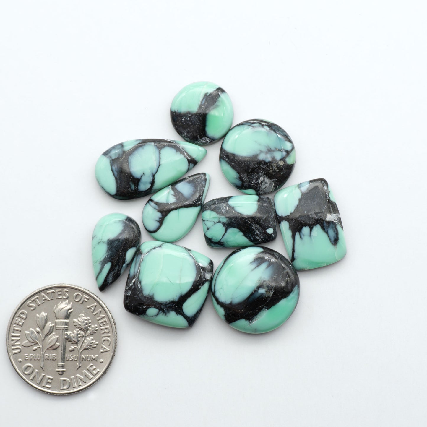 Shop Variscite cabochons with natural matrix patterns, ideal for silversmiths and jewelry makers creating custom rings and pendants.